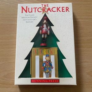 Vintage 1996 nutcracker ornament with mini book